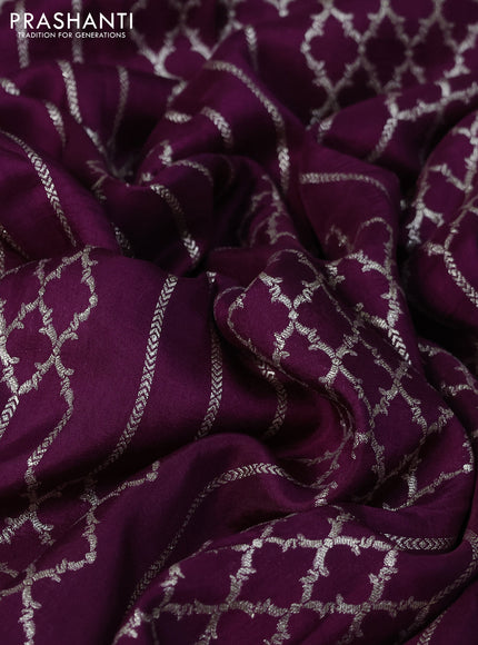 Munga tussar saree purple with allover zari weaves and lace work blue