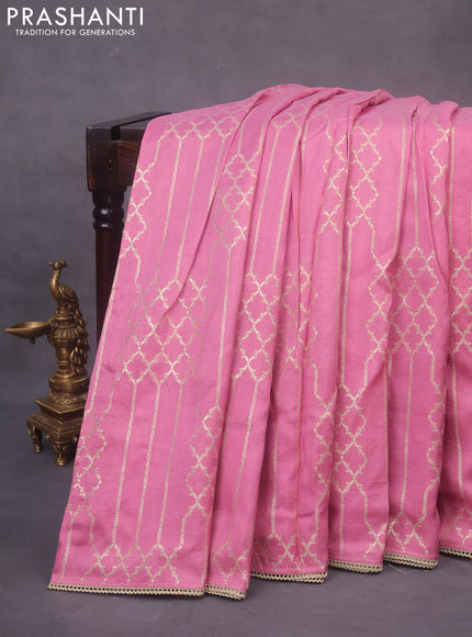 Munga tussar saree mauve pink with allover zari weaves and lace work blue