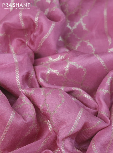 Munga tussar saree mauve pink with allover zari weaves and lace work blue