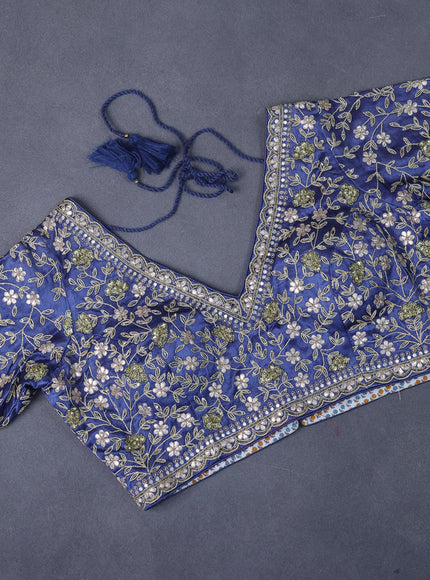 Organza saree blue with allover zari weaves and zari woven border