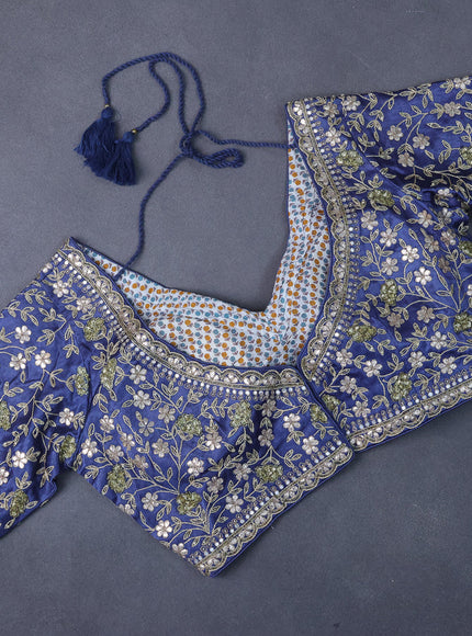 Organza saree blue with allover zari weaves and zari woven border