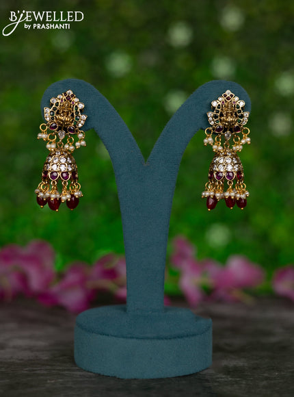 Antique jhumka lakshmi design with kemp & cz stones and pearl & pink beads hangings