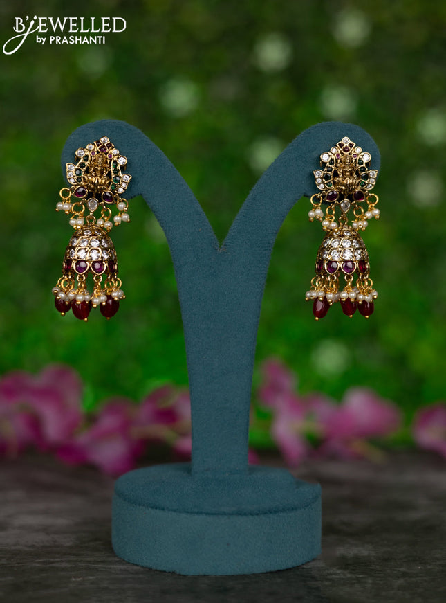 Antique jhumka lakshmi design with kemp & cz stones and pearl & pink beads hangings