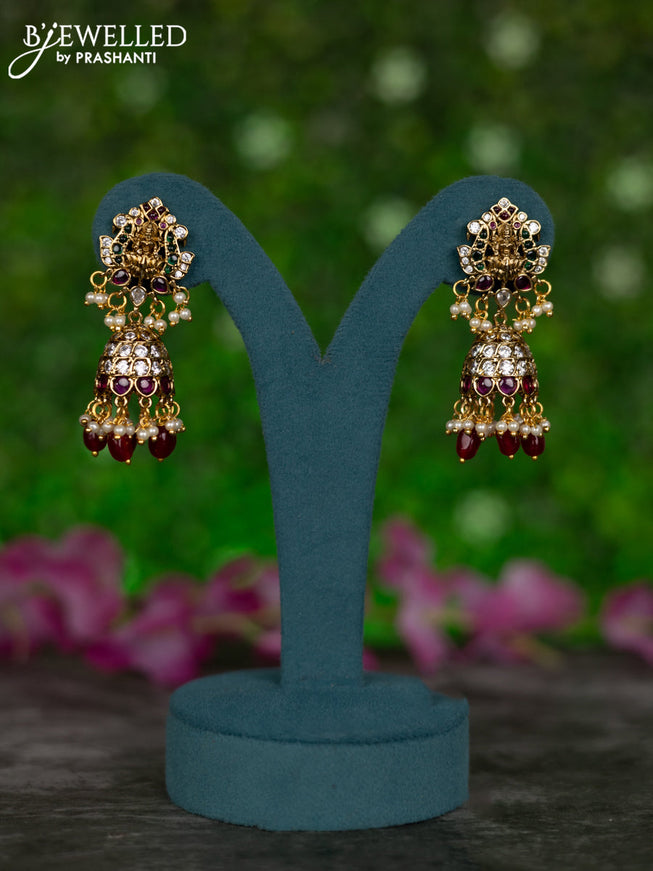 Antique jhumka lakshmi design with kemp & cz stones and pearl & pink beads hangings