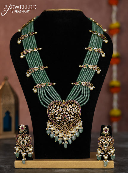 Beaded multilayer necklace heart shape pendant with kemp & cz stones and pearl hangings