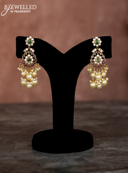 Beaded multilayer mint green necklace with kemp & cz stones and pearl hangings in victorian finish