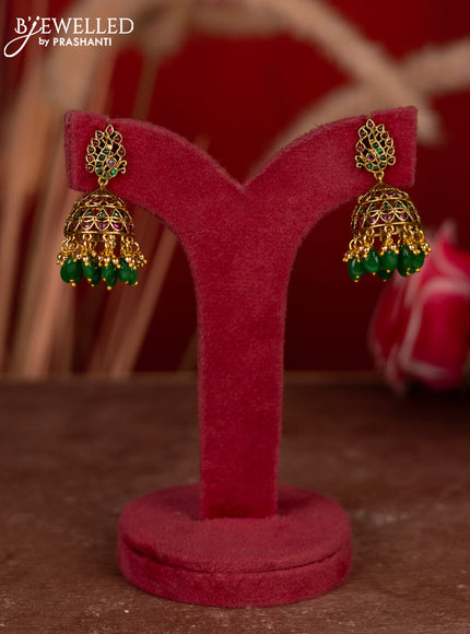 Antique jhumkas with kemp stones and green & golden beads hangings