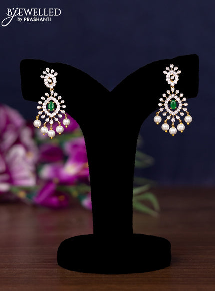Zircon necklace with emerald & cz stones and pearl hangings in gold finish
