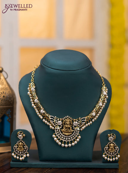 Zircon necklace lakshmi design with cz stones and pearl hangings in gold finish