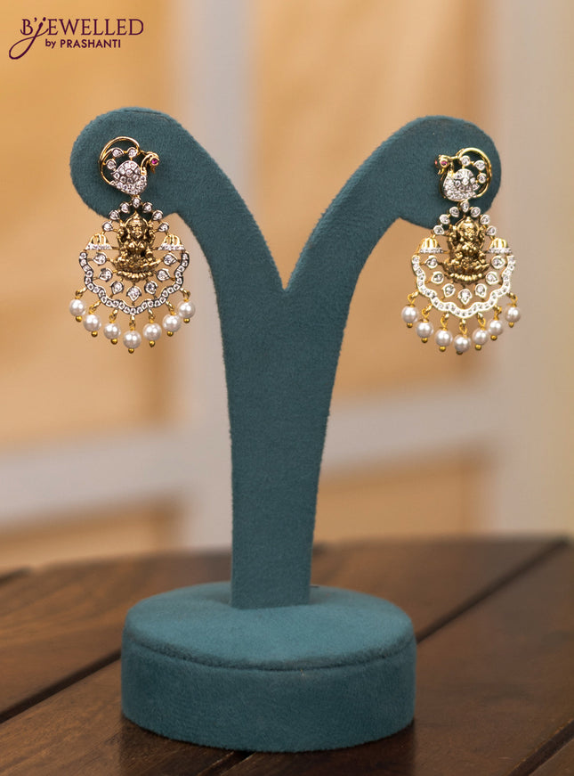 Zircon necklace lakshmi design with cz stones and pearl hangings in gold finish