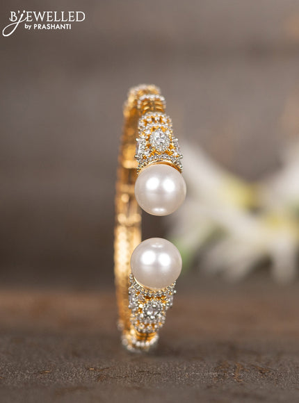 Bracelets with cz stones and pearls in gold finish