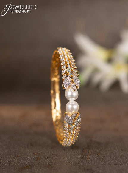 Bracelets with cz stones and pearls in gold finish