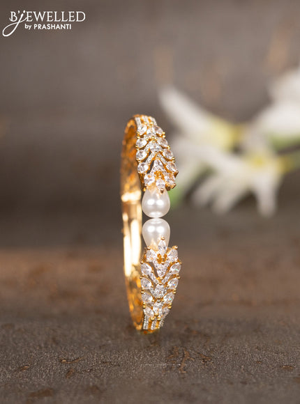 Bracelets with cz stones and pearls in gold finish