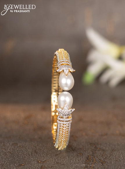 Bracelets with cz stones and pearls in gold finish