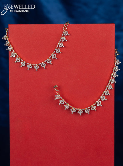 Zircon maatal with cz stones in gold finish