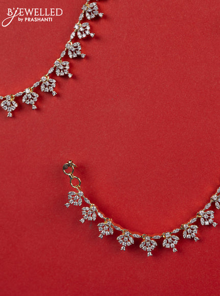 Zircon maatal with cz stones in gold finish