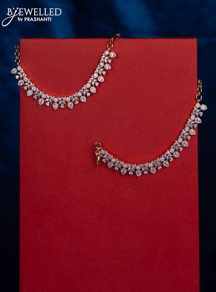 Zircon maatal with cz stones in gold finish