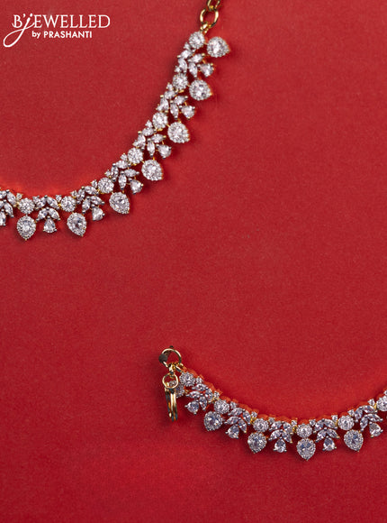 Zircon maatal with cz stones in gold finish