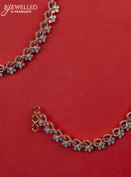 Zircon maatal with cz stones in gold finish