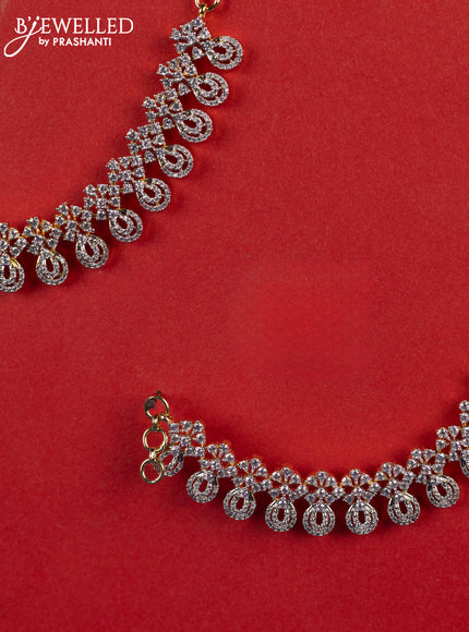 Zircon maatal with cz stones in gold finish