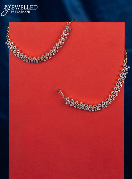 Zircon maatal with cz stones in gold finish