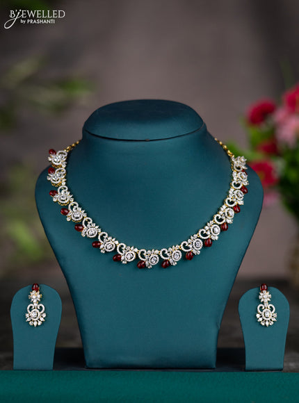 Zircon necklace with maroon beads and cz stones in gold finish