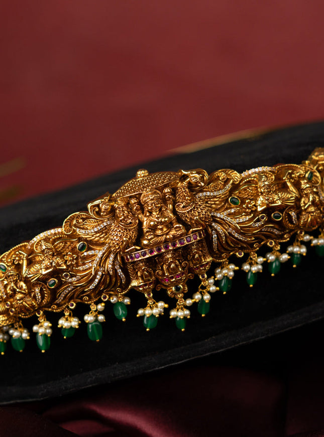 Antique self embossed hip belt lakhmi design with kemp & cz stones and pearl & green beads hangings