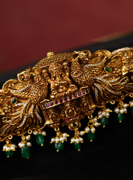 Antique self embossed hip belt lakhmi design with kemp & cz stones and pearl & green beads hangings