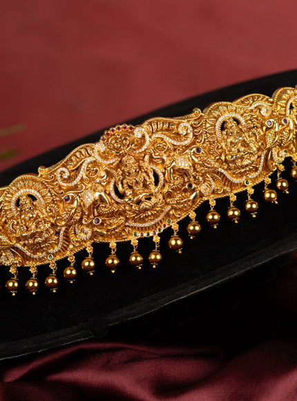 Antique self embossed hip belt lakhmi design with kemp & cz stones and pearl & golden beads hangings