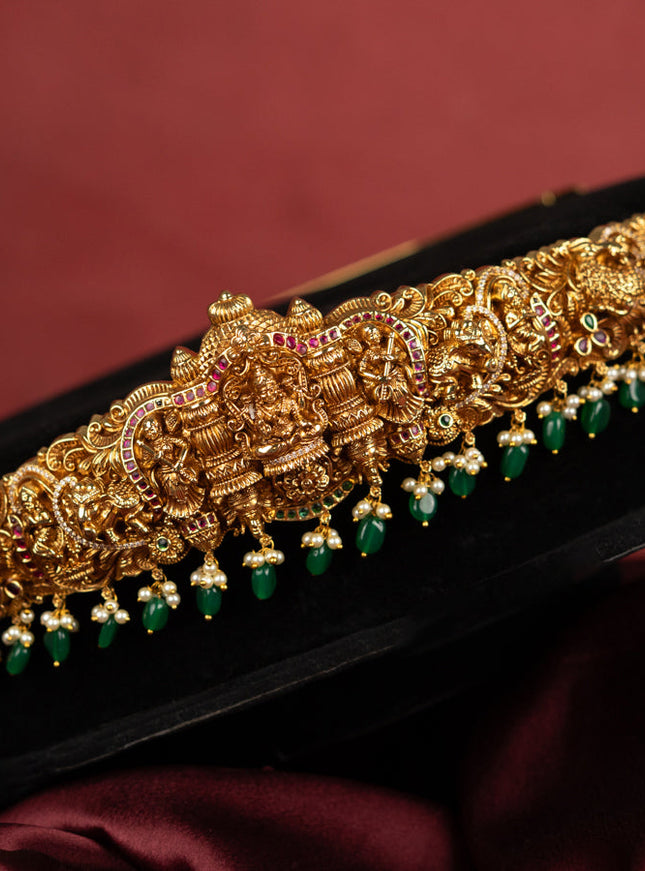 Antique self embossed hip belt lakhmi design with kemp & cz stones and pearl & green beads hangings
