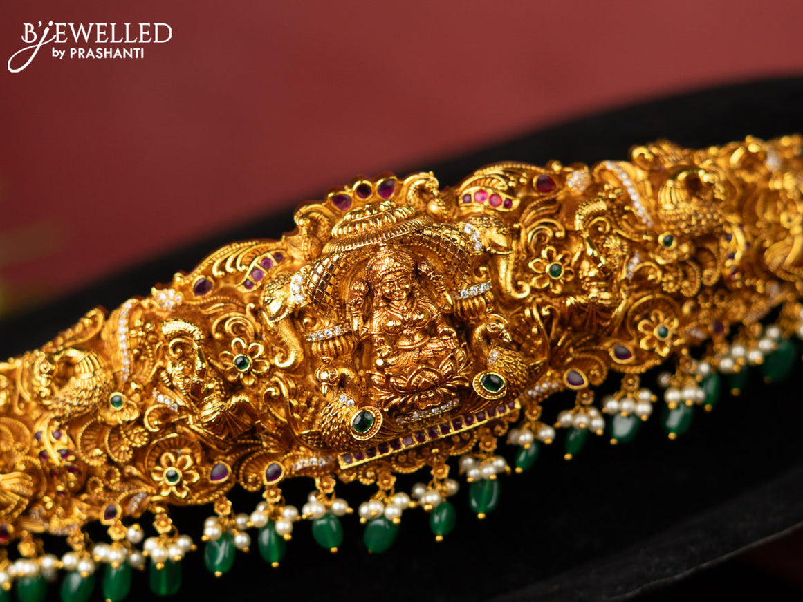 Antique self embossed hip belt lakhmi design with kemp & cz stones and pearl & green beads hangings