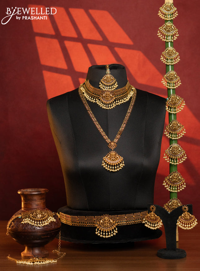 Antique bridal set lakshmi design with kemp stones and pearl hangings