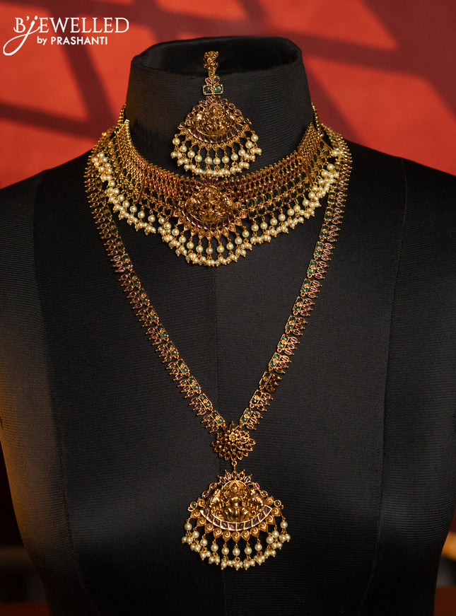 Antique bridal set lakshmi design with kemp stones and pearl hangings