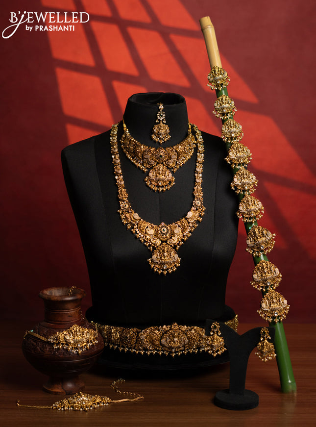 Antique bridal set lakshmi design with kemp & cz stones and pearl & golden beads hangings