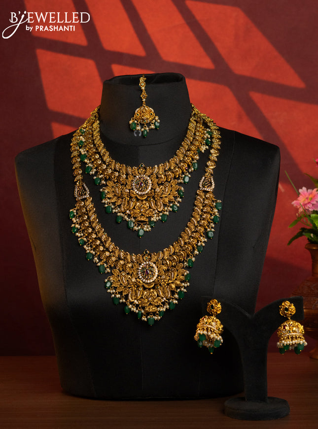 Antique combo set peacock design with kemp & cz stones and pearl & green beads hangings