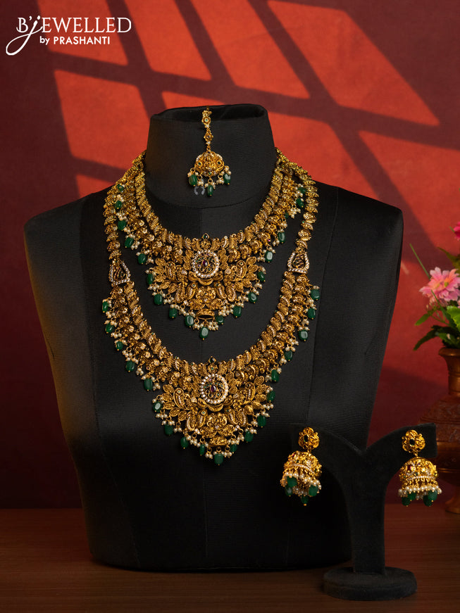 Antique combo set peacock design with kemp & cz stones and pearl & green beads hangings