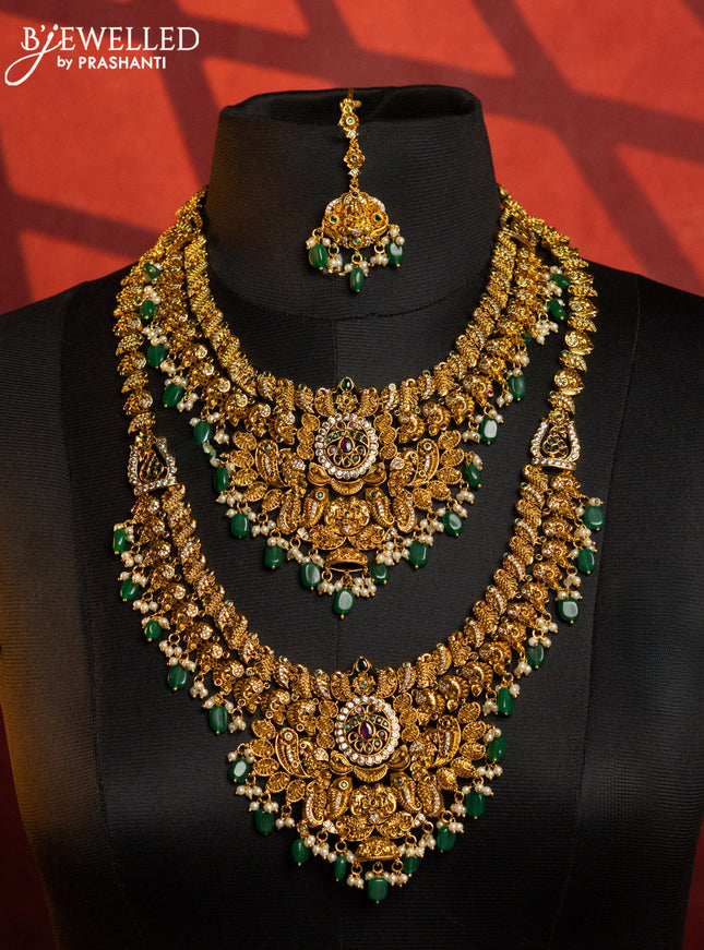 Antique combo set peacock design with kemp & cz stones and pearl & green beads hangings