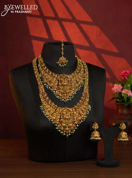 Antique combo set lakshmi design with kemp & cz stones and pearl & green beads hangings