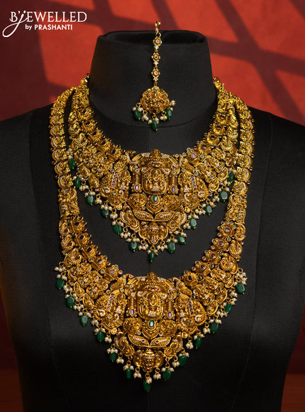 Antique combo set lakshmi design with kemp & cz stones and pearl & green beads hangings