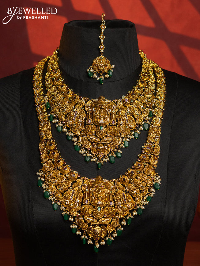 Antique combo set lakshmi design with kemp & cz stones and pearl & green beads hangings