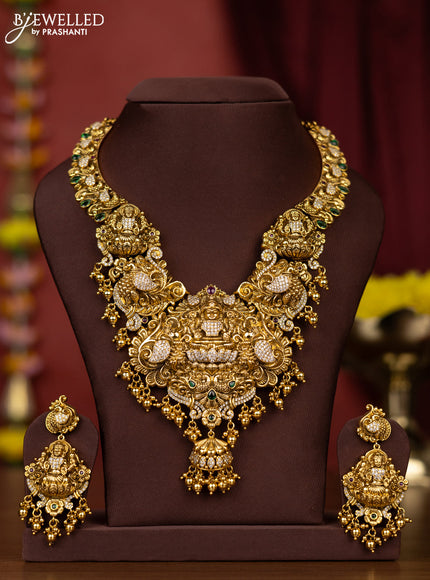 Antique necklace lakshmi design with kemp & cz stones and golden beads hangings