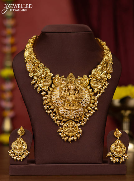 Antique necklace lakshmi design with cz stones and pearl & golden beads hangings
