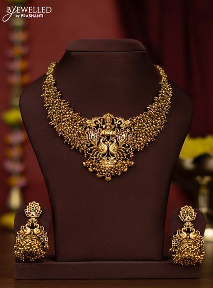 Antique necklace lakshmi & peacock design with kemp stones and golden beads hangings