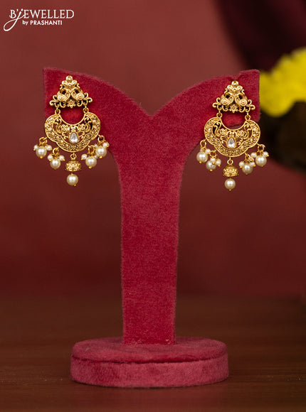 Antique necklace peacock design with kundan stones and pearl hangings