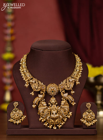 Antique necklace lakshmi & peacock design with cz stones and pearl & golden beads hangings
