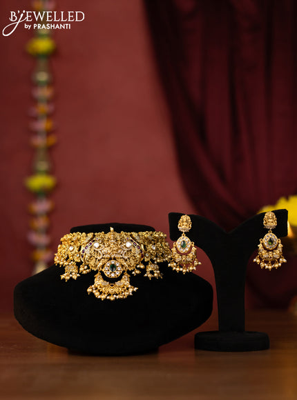 Antique choker lakshmi design with kemp & kundan cz stones and pearl & golden beads hangings