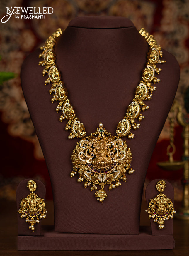 Antique haaram lakshmi pendant with kemp & cz stones and pearl & golden beads hangings