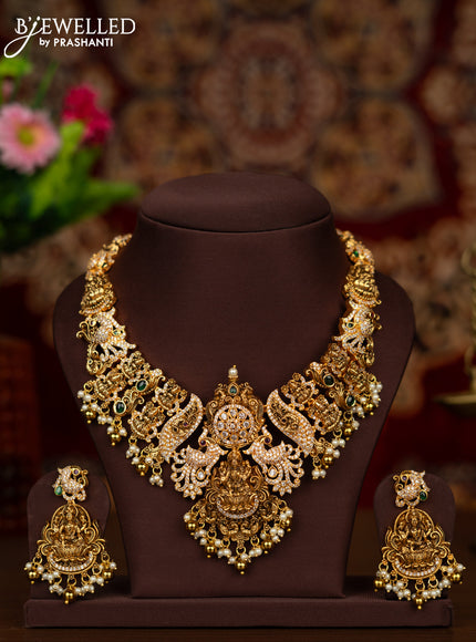 Antique necklace lakshmi design with kemp & cz stones and pearl & golden beads hangings