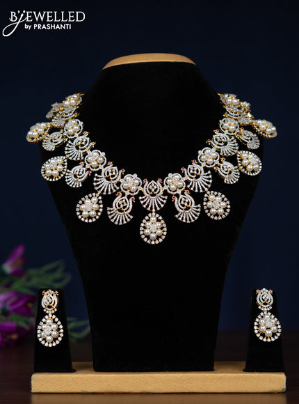 Zircon necklace with ruby & cz stones and pearls in gold finish