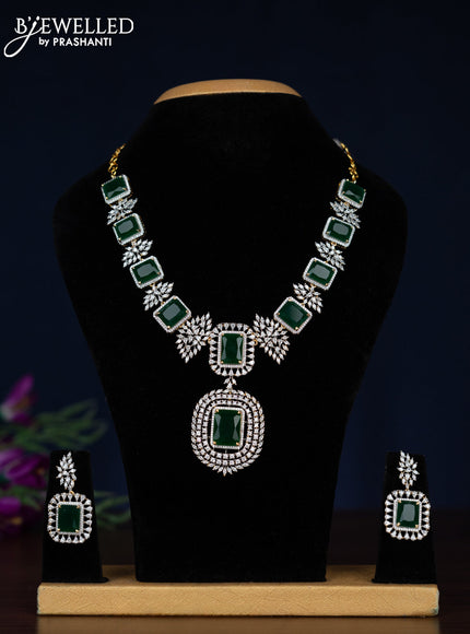 Zircon necklace with emerald and cz stones in gold finish